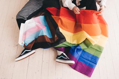 rainbow flag on people's legs