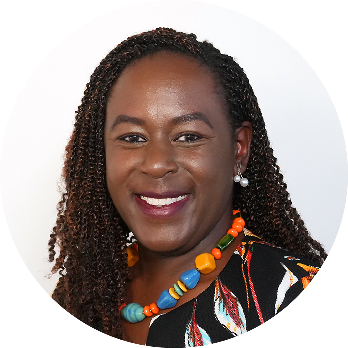 Yvonne's headshot with multicolored necklace