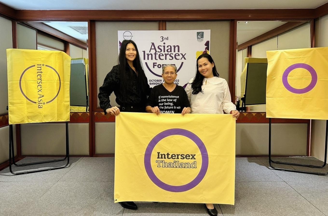 Intersex Thailand team with an intersex flag