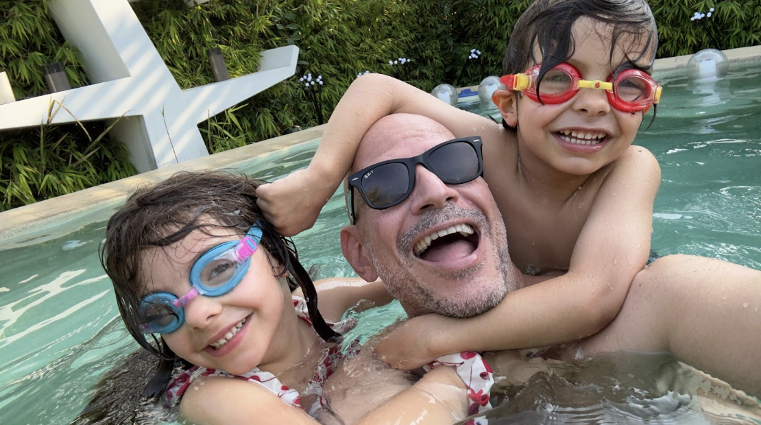 The Moran family playing in a pool