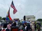 Large group photo of people marching in the street during WorldPride